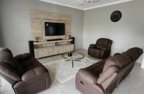 Matsapha Casa | Cozy bedroom ensuite, fully equipped retreat.