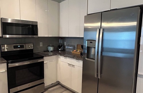 Industry Cama Y Desayuno | Cozy bedroom in charming apartment close to Manhattan