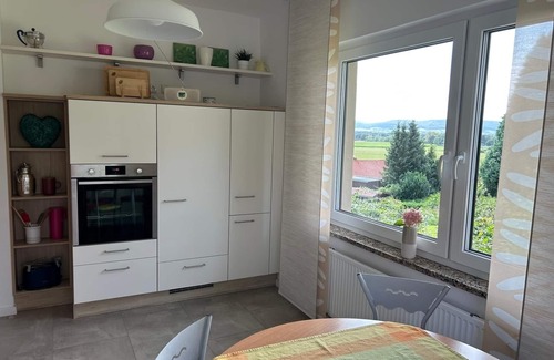 Hessisch Oldendorf Casa | Cozy, bright vacation home with beautiful views, sunny balcony, tiled stove