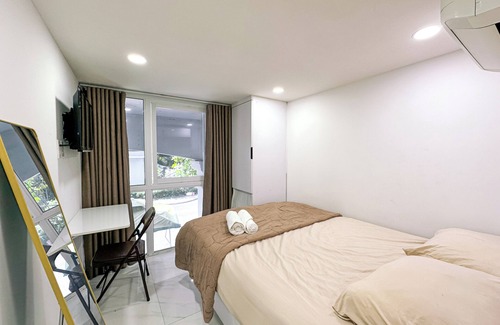 Tan Qui Dong Apartamento | Cozy budget room in D7 with chill rooftop