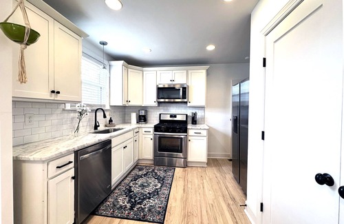 Rolling Acres Casa | Cozy bungalow in walkable East Nashville with inviting porch