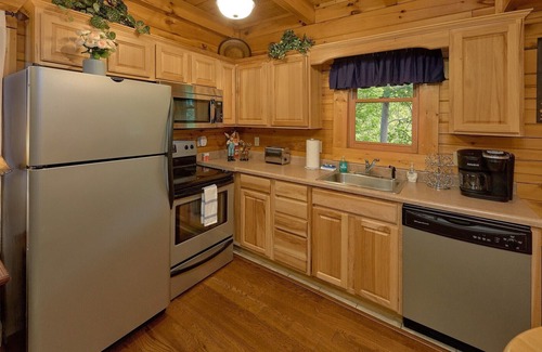 Gatlinburg Cabina | Acogedora cabaña, perfecta para una luna de miel o una escapada familiar llena de aventuras.