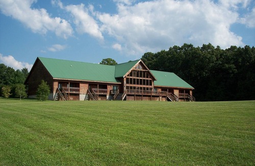 Spencer Cabina | Cozy cabin with fire pit, hot tub, and pool, and a swing set in the backyard!