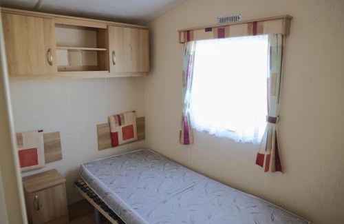 Vlissegem Otro | Cozy caravan on small campsite near woods & sea