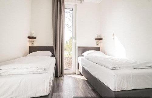 De Cocksdorp Chalet De Esquí | Cozy Chalet Near North Sea
