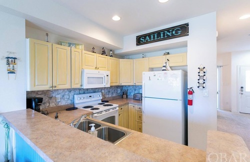 Bermuda Bay Condominio | Condominio acogedor cerca de la playa