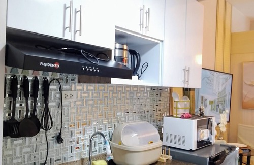 Bago Bantay Condominio | Cozy condo with WiFi where you can experience life's simple pleasures with US!