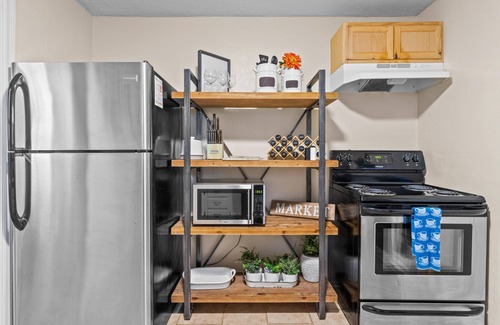 Blue Township Casa | Cozy Cottage Minutes From Stadiums + Parking and Fenced in Yard