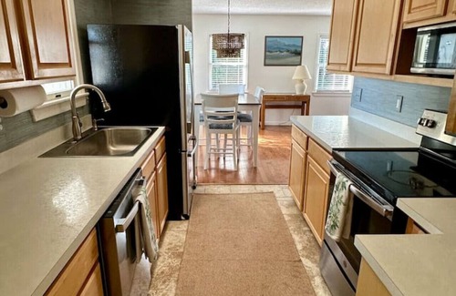 Colington Harbour Casa | Cozy Cottage on the Canal (Hot Tub, Kayaks & Pool)