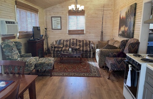 Pangburn Cabina | Cozy family fish camp on the Little Red River, a premier trout fishing stream!