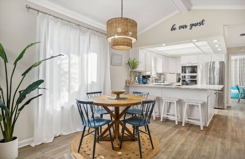 Lower Grand Lagoon Cabaña | Cozy family vacation in Panama City Beach with golf cart ,private beach, pools