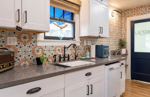 Encanto Casa | Cozy historic home centrally located. Pet friendly! Beautiful outdoor fireplace.
