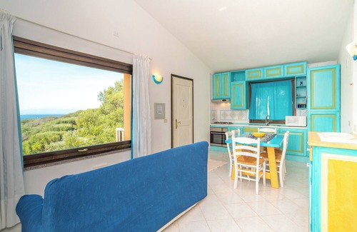 Barrabisa Apartamento | Acogedor apartamento vacacional "Conchiglia Blu" con jardín