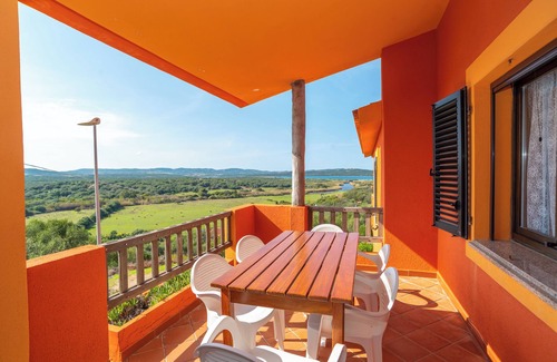 Barrabisa Apartamento | Acogedor apartamento vacacional "Conchiglia Verde" con balcón, vistas al mar y Wi-Fi