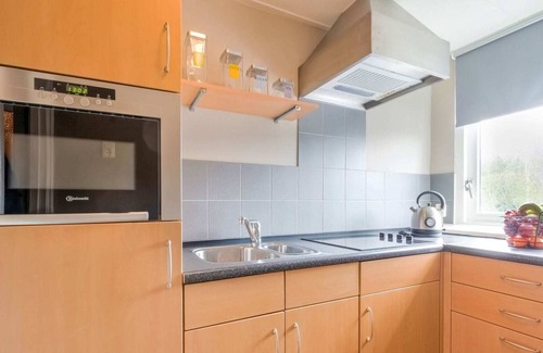 Elim Casa | Acogedora casa de vacaciones en Elim con jardín amueblado