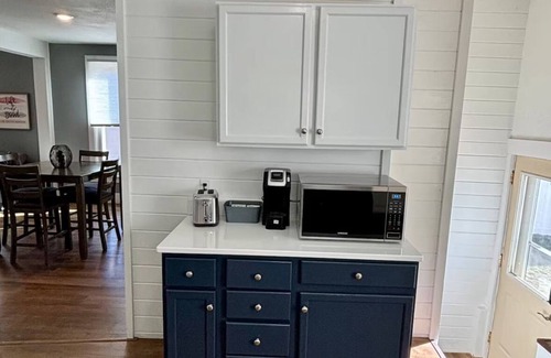Sioux Falls Casa | Cozy home near DT, Premier Center & Hospital- Foosball, 65"TV & Fenced Yard