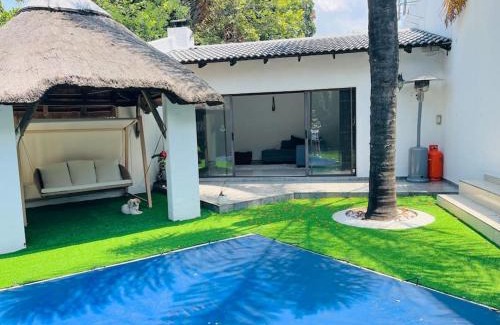 Lone Hill Casa | Cozy home with a pool in a leafy suburb of Lonehill, wake up to the sound of trees & birds!