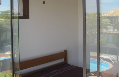 Praia Rasa Casa | Acogedora casa en una comunidad cerrada con 3 suites.