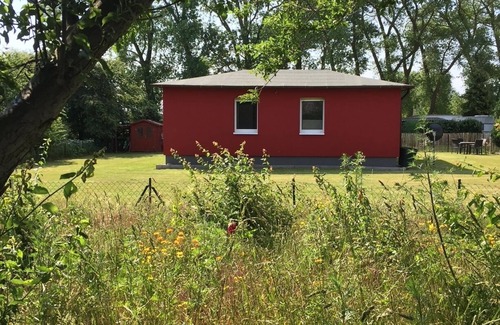 Ummanz Casa | Cozy "house on the dike" with a large garden invites you to relax