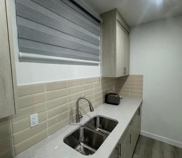 Airdrie Apartamento | Cozy Inn new basemt wt sep entrance contains 1 bdrm and den for up to 4 guests