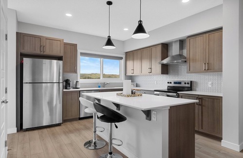 Southeast Calgary Casa | This Home is 3 BR 2.5 baths in Calgary near river trails,Golf & Spruce Meadows