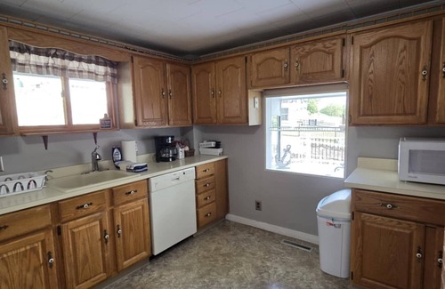 Alton Bay Casa | Spacious 4-bedroom house with, Private Beach, WiFi, AC in peaceful Alton