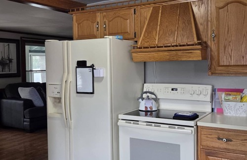 Alton Bay Casa | Spacious 4-bedroom house with, Private Beach, WiFi, AC in peaceful Alton