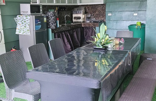 Dasmarinas Casa | Cozy Natural Haven w/ Netflix, Videoke & Alfresco Dining