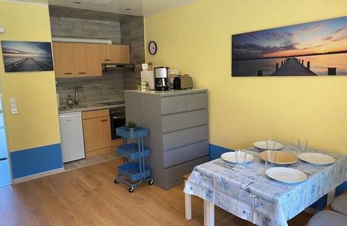 Nordseebad Burhave Condominio | Cozy nest for a relaxing break * ground floor * up to 5p * dogs * pool * sauna