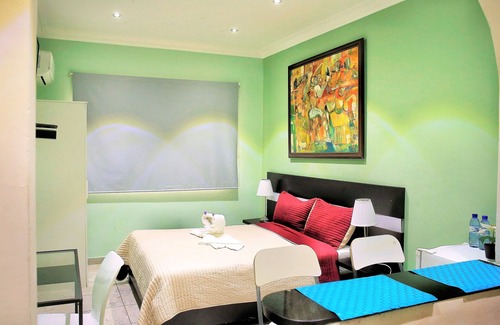 Santo Domingo Hotel | Cozy room for rent in RIG Puerto Malecon hotel