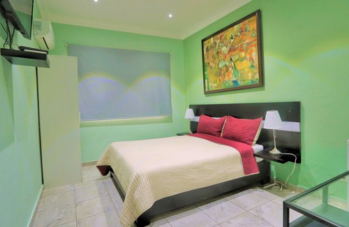 Santo Domingo Hotel | Cozy room for rent in RIG Puerto Malecon hotel