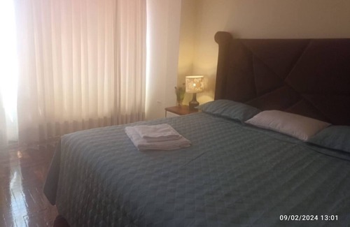 Puno Casa | Cozy room with TV and private bathroom