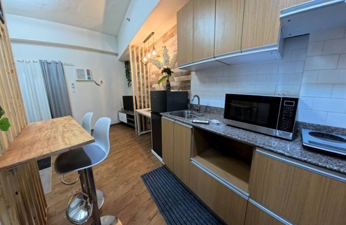 Mactan Export Processing Zone Apartamento | Cozy studio in Mactan Lapu-lapu City with fitness room, pool, WiFi, etc