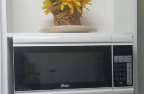 Road Town Apartamento | Cozy Studio4 in serene Tortola with AC, WiFi. Enjoyable getaway with Sunset View