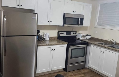 Regina Apartamento | Cozy & Stylish One Bedroom Suite @ Harbor Landing