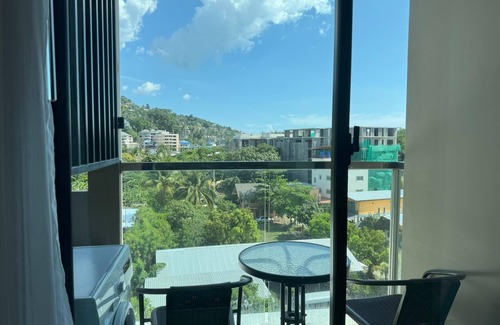 Cherngtalay Apartamento | Cozy top floor apartment with washer & Wi-Fi