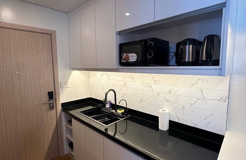 Marilao Condominio | Cozy1-bedroom condo with AC and WiFi in SMDC Marilao, nearby SM Mall & PH Arena