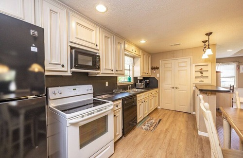 Cedar Lane Casa | Creekfront Home w/ Boat Lift & Fishing Pier