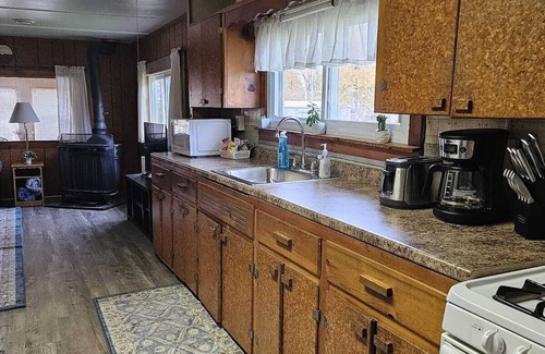 Ashville Cabaña | Creekside Cottage w/Lake access, Dock, Hot tub, Canoe/Kayaks