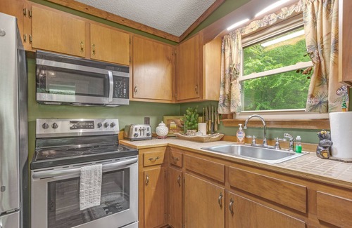 Sylva Casa | Creekside getaway with full kitchen, furnished deck, & gas grill