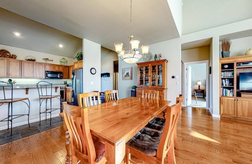 Redmond Casa | Creekside home with private hot tub & fireplace - access to pools, hot tub, gym