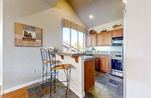 Redmond Casa | Creekside home with private hot tub & fireplace - access to pools, hot tub, gym