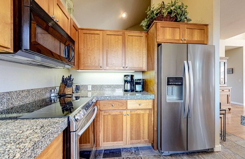 Redmond Casa | Creekside home with private hot tub & fireplace - access to pools, hot tub, gym
