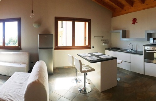 Pulciano Apartamento | Ático Cryss - Grosszügige Mansardenwohnung mit atemberaubendem Seeblick