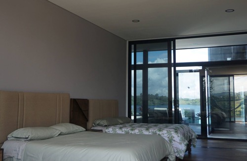 Guatape Villa | Crystal Palace with heated pool, hot tub and lake access