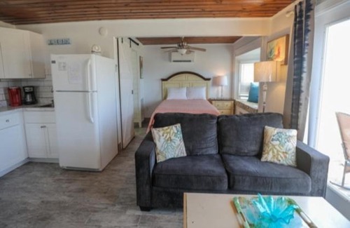 Kure Beach Casa | Crystal Shores Unit 4 - Ocean Front Unit with views of the sand dunes and ocean! steps away from beach! villa