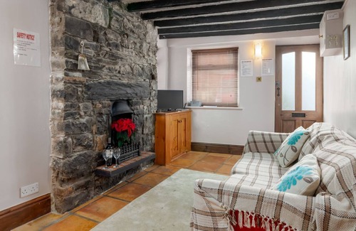 Castletown Cabaña | Curlew Cottage - una casa de vacaciones con capacidad para 2 personas en 1 habitación