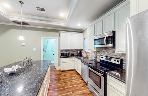 Pointe San Luis Casa | Bungalow para perros con piscina compartida y mucho espacio para familias.