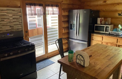 Moose Lake Casa | Custom built log home on 40 acres & in the woods! Snowmobile right from home!