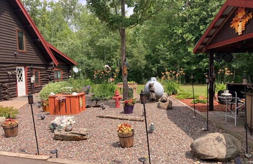 Moose Lake Casa | Custom built log home on 40 acres & in the woods! Snowmobile right from home!